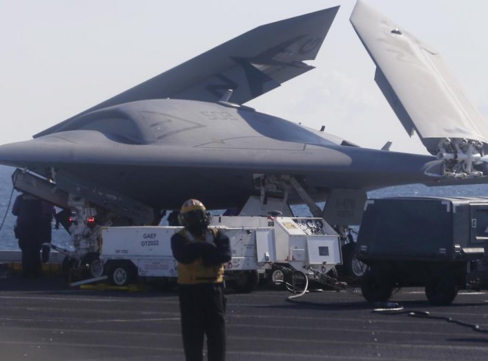 An X-47B pilot-less drone combat aircraft is pictured with its wings folded before being launched for the first time off an aircraft carrier, the USS George H. W. Bush, in the Atlantic Ocean off the coast of Virginia, May 14, 2013. REUTERS/Jason Reed