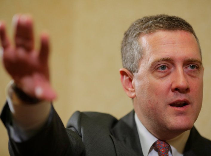 James Bullard, President of the St. Louis Federal Reserve Bank, speaks during an interview with Reuters in Boston, Massachusetts August 2, 2013. REUTERS/Brian Snyder