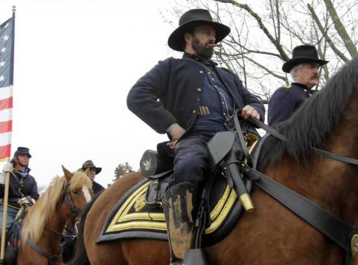An actor portraying Ulysses S. Grant arrives at Appomattox during the 150th anniversary re-enactment of the surrender of General Robert E. Lee to General Ulysses S. Grant at the Court House National Historic Park in Appomattox, Virginia, April 9, 2015. RE