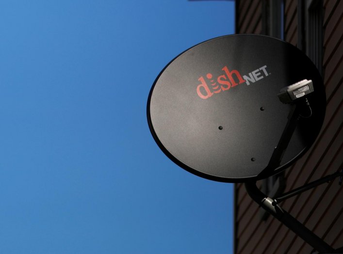 A Dish Network receiver hangs on a house in Somerville, Massachusetts, U.S., February 21, 2017. REUTERS/Brian Snyder