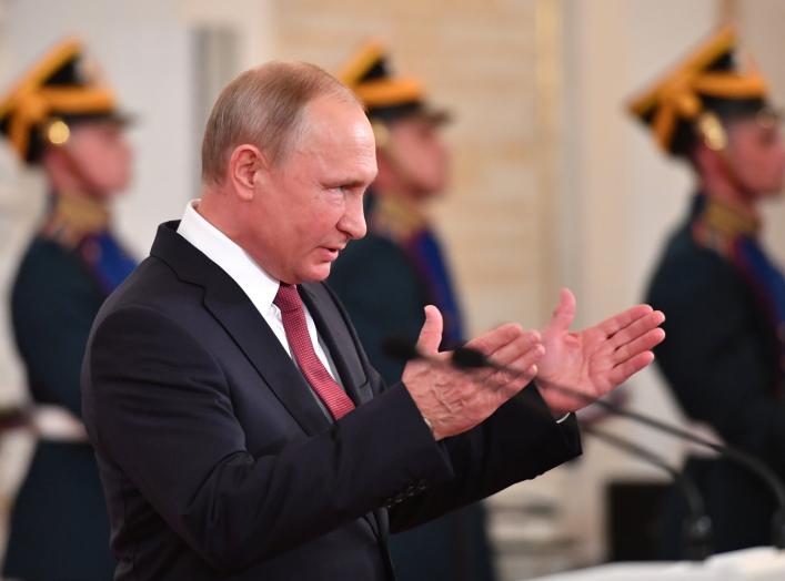 Russian President Vladimir Putin attends an awarding ceremony, marking the Day of Russia, at the Kremlin in Moscow, Russia June 12, 2018. Yuri Kadobnov/Pool via REUTERS