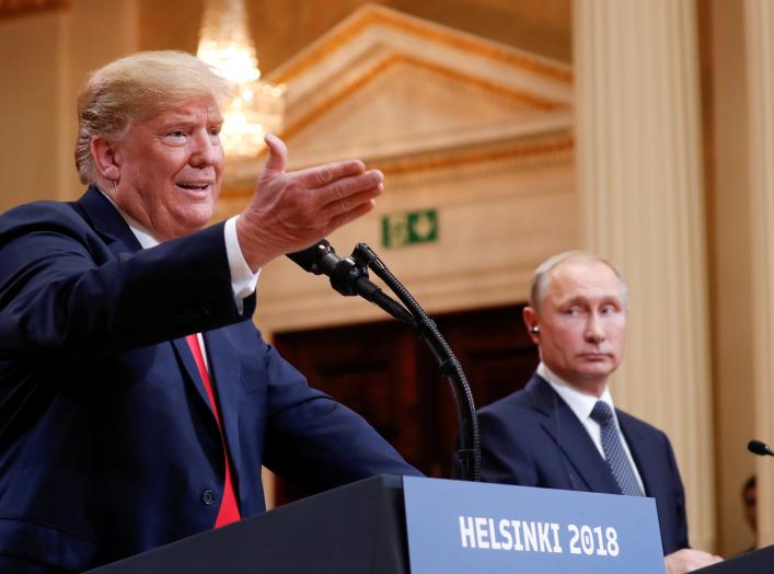 U.S. President Donald Trump gestures during a joint news conference with Russia's President Vladimir Putin after their meeting in Helsinki, Finland, July 16, 2018. REUTERS/Kevin Lamarque