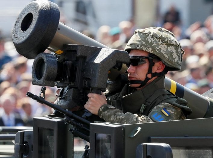A Ukrainian army servicemember rides with a Javelin anti-tank missile during a military parade marking Ukraine's Independence Day in Kiev, Ukraine August 24, 2018. REUTERS/Gleb Garanich