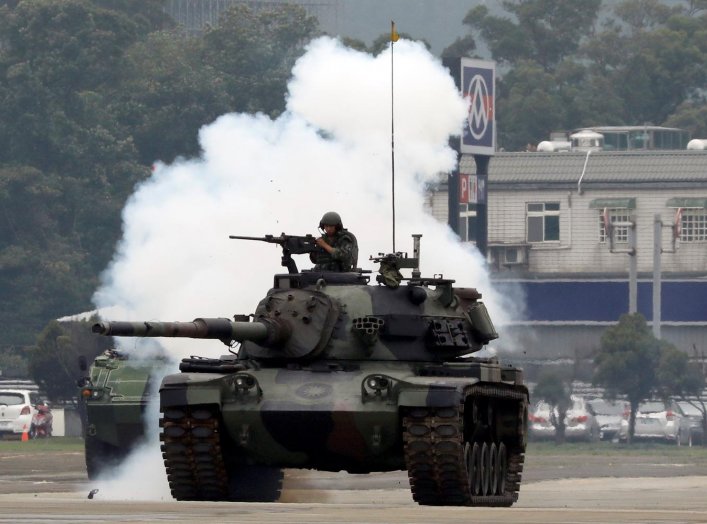 A 584th armored brigade's CM-11 Brave Tiger tank takes part in anti-invasion drill, simulating the China's People's Liberation Army (PLA) invading the island, in Taoyuan, Taiwan October 9, 2018. REUTERS/Tyrone Siu