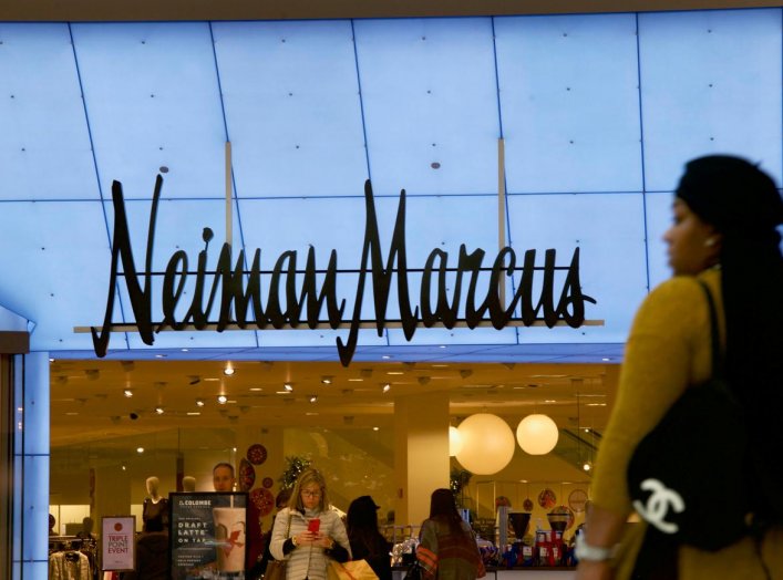 Shoppers enter and exit the Neiman Marcus at the King of Prussia Mall, United States' largest retail shopping space, in King of Prussia, Pennsylvania, U.S., December 8, 2018. REUTERS/Mark Makela