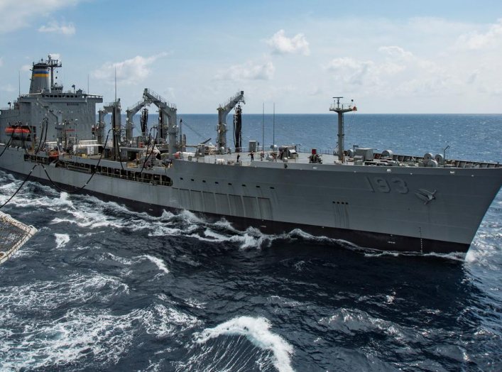 Military Sealift Command fleet replenishment oiler USNS Walter S. Diehl (T-AO 193) pulls alongside hospital ship USNS Mercy (T-AH 19) to deliver supplies and mail by a connected replenishment in the South China Sea August 15, 2016. Picture taken August 15