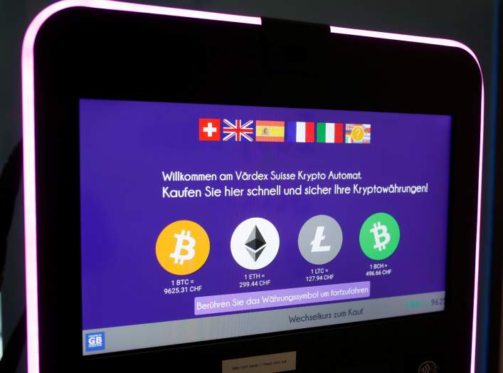 The exchange rates and logos of Bitcoin (BTH), Ether (ETH), Litecoin (LTC) and Bitcoin Cash (BCH) are seen on the display of a cryptocurrency ATM of blockchain payment service provider Vaerdex at the headquarters of Swiss Falcon Private Bank in Zurich, Sw