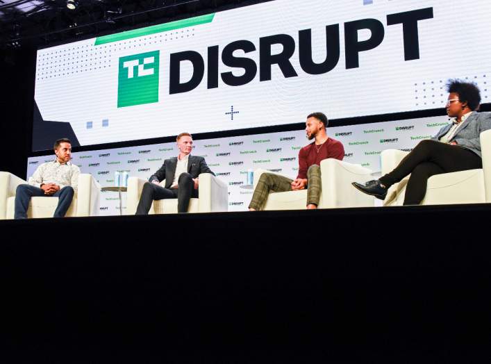 SnapTravel CEO Hussein Fazal, SC30 Inc. President Bryant Barr and Stephen Curry, Golden Gate Warriors MVP, introduce SC30 Inc. during the TechCrunch Disrupt forum in San Francisco, California, U.S. October 2, 2019. REUTERS/Kate Munsch