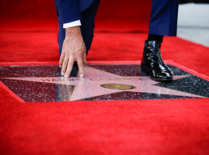 Entertainer Harry Connick Jr. touches his star during his Hollywood Walk of Fame star ceremony in Los Angeles, California, U.S., October 24, 2019. REUTERS/Danny Moloshok