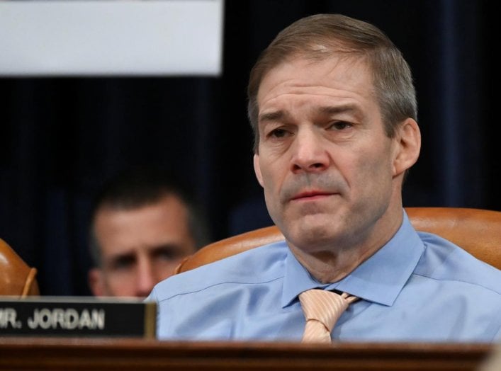 Republican member of the U.S. House Judiciary Committee Rep. Jim Jordan (R-OH) reacts as the committee votes to approve two articles of impeachment against U.S. President Donald Trump and send them on to the full House of Representatives for consideration