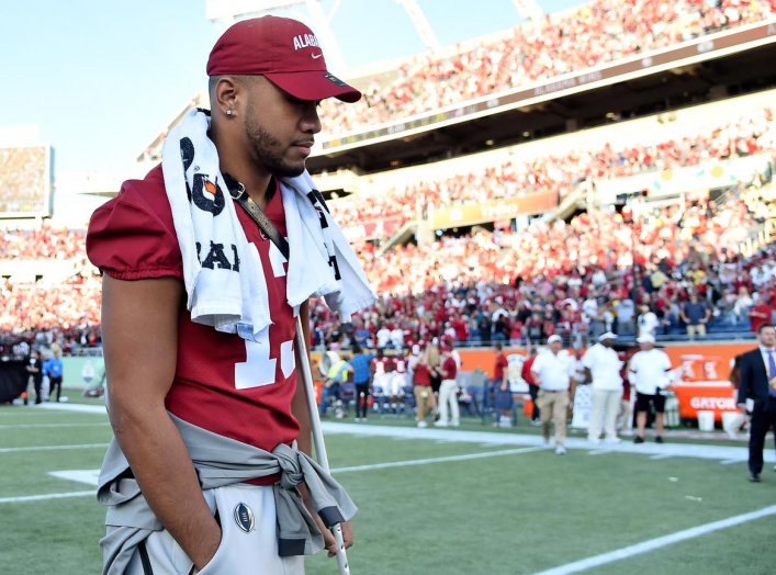 Jan 1, 2020; Orlando, Florida, USA; Alabama Crimson Tide quarterback Tua Tagovailoa (13) walks off the field after defeating the Michigan Wolverines in the Citrus Bowl at Camping World Stadium. Mandatory Credit: Jasen Vinlove-USA TODAY Sports