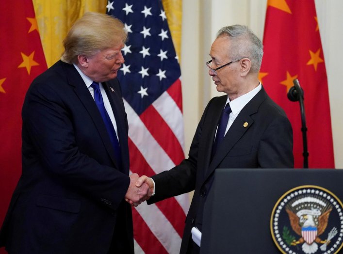 U.S. President Donald Trump shakes hands with Chinese Vice Premier Liu He during a signing ceremony for "phase one" of the U.S.-China trade agreement in the East Room of the White House in Washington, U.S., January 15, 2020. REUTERS/Kevin Lamarque