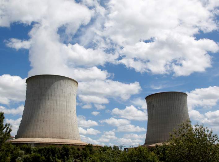 FILE PHOTO: Cooling towers of Electricite de France (EDF) nuclear plant are seen in Saint-Laurent-Des-Eaux near Orleans, France, June 17, 2019. REUTERS/ Regis Duvignau/File Photo