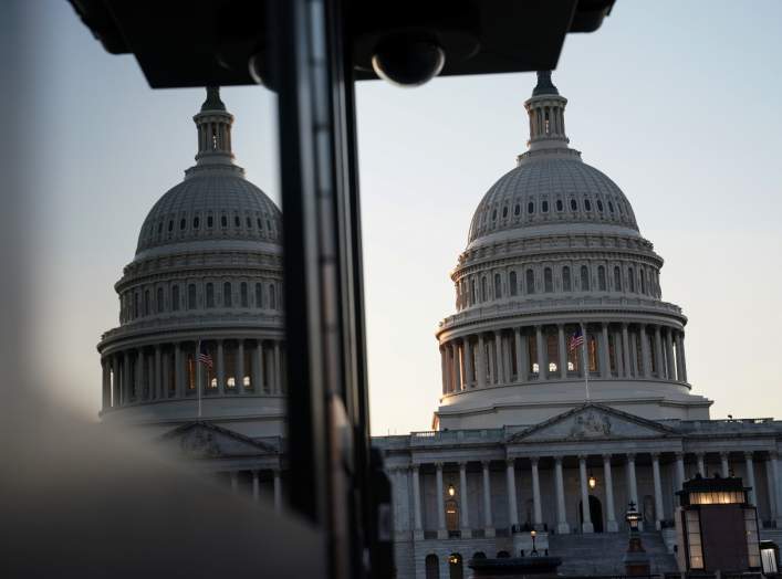 The U.S. Capitol building exterior is seen at sunset as members of the Senate participate in the first day of the impeachment trial of President Donald Trump in Washington, U.S., January 21, 2020. REUTERS/Sarah Silbiger.