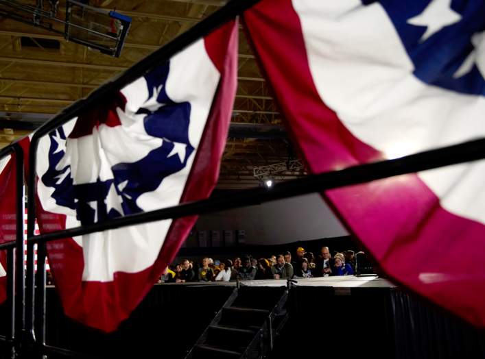 A bunting banner hangs over a railing for Democratic presidential candidate former South Bend, Indiana mayor Pete Buttigieg at his Caucus night rally in Des Moines, Iowa, U.S., February 3, 2020. REUTERS/Eric Thayer