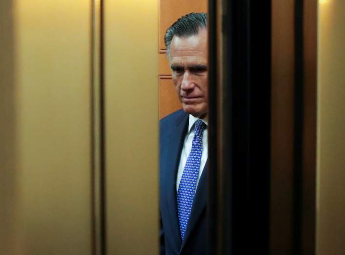 U.S. Senator Mitt Romney (R-UT) rides in a U.S. Capitol elevator to the U.S. Senate floor to cast a guilty vote during the final votes in the Senate impeachment trial of U.S. President Donald Trump on Capitol Hill in Washington, U.S., February 5, 2020. RE