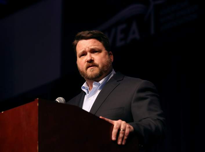 Iowa Democratic Party Chair Troy Price speaks ahead of the Iowa Caucus results announcement in Des Moines, Iowa, U.S., February 4, 2020. REUTERS/Brenna Norman