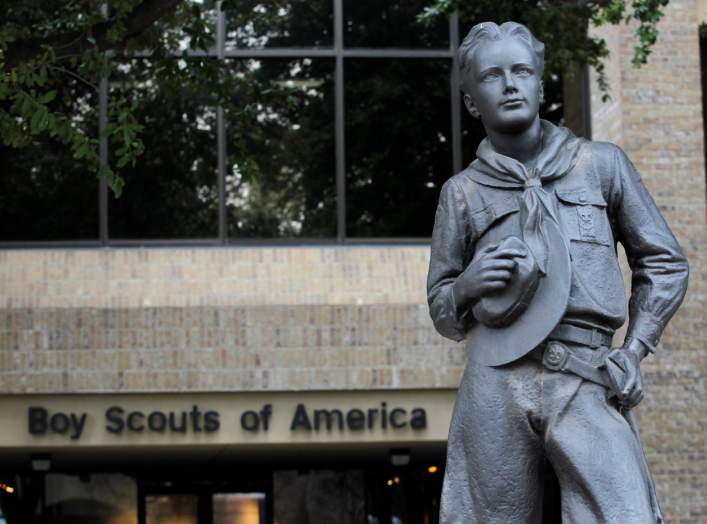 FILE PHOTO: The statue of a scout stands in the entrance to the Boy Scouts of America headquarters in Irving, Texas, February 5, 2013. REUTERS/Tim Sharp/File Photo