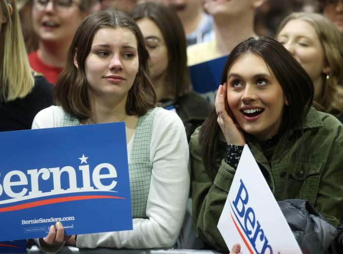 Supporters react as Democratic 2020 U.S. presidential candidate Senator Bernie Sanders rallies in an overflow room aside from the main event in St. Paul, Minnesota, U.S. March 2, 2020. REUTERS/Jonathan Ernst