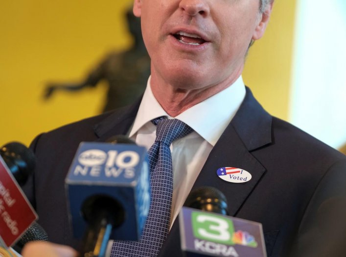 California's Governor Gavin Newsom wears an ?I Voted? sticker as he speaks to the media after casting his ballot at a voting center at The California Museum, during the presidential primaries on Super Tuesday in Sacramento, CA U.S., March 3, 2020. REUTERS