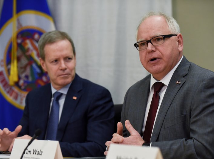 Minnesota governor Tim Walz, addresses the news alongside U.S. Vice President Mike Pence (not pictured) and 3M CEO, Mike Roman, at the 3M company's headquarters in Maplewood, Minnesota, U.S. March 5, 2020. REUTERS/Nick Pfosi