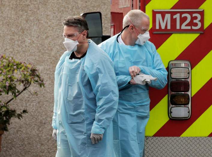 Medics prepare to transfer a patient into an ambulance at the Life Care Center of Kirkland, the long-term care facility linked to several confirmed coronavirus cases in the state, in Kirkland, Washington, U.S. March 5, 2020. REUTERS/David Ryder