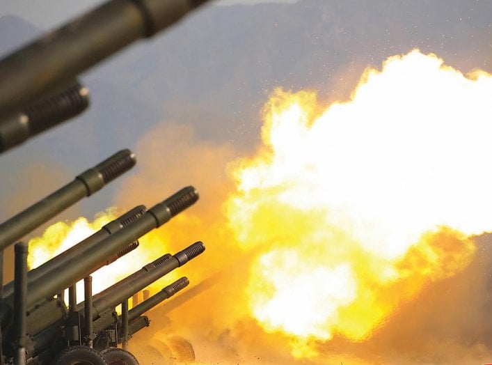 An artillery fire competition between the artillery units under the Korean People's Army Corps 7 and Corps 9 takes place at a training ground in North Korea, March 12, 2020 in this picture supplied by North Korea's Korean Central News Agency (KCNA) 
