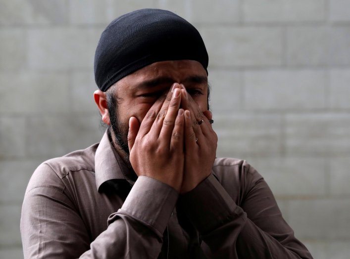 An Afghan Sikh cries inside a Sikh religious complex after an attack in Kabul, Afghanistan March 25, 2020.REUTERS/Mohammad Ismail