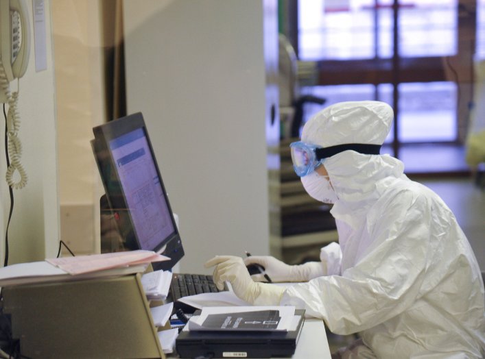 A medical staff member wearing a protective suit works at the special unit of the Sklifosovsky Research Institute of Emergency Medicine for the patients who are suspected to have contracted COVID-19, caused by the coronavirus, in Moscow, Russia March 25