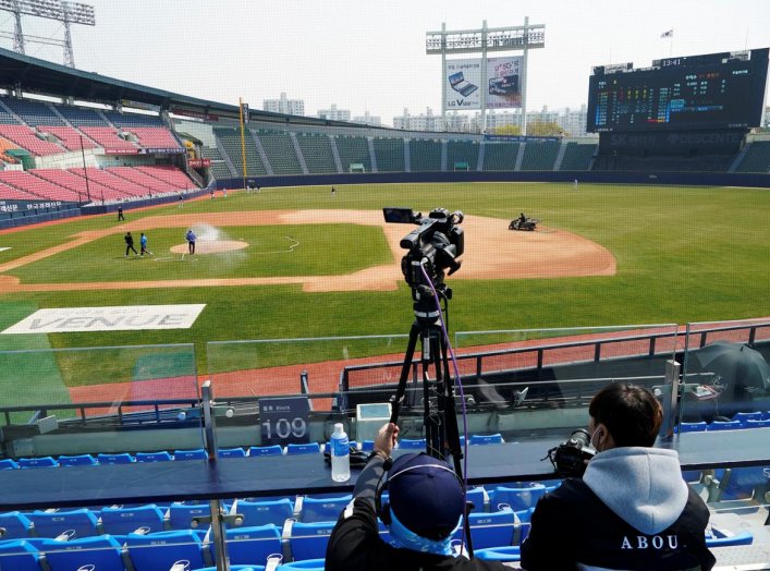 Employees of LG Twins get ready to broadcast their intra-team game which is played for their fans at a stadium emptied due to the spread of the coronavirus disease (COVID-19) in Seoul, South Korea, April 2, 2020. REUTERS/Kim Hong-Ji