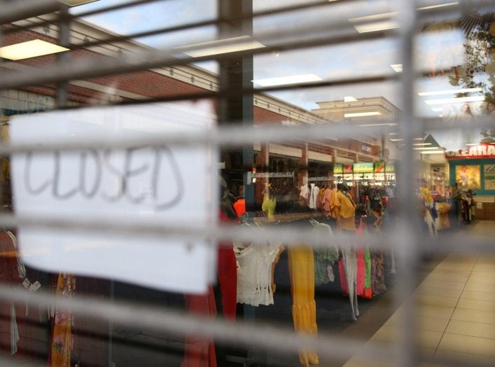 A clothing store in a shopping center is closed during the coronavirus disease (COVID-19) outbreak in Oxon Hill, Maryland, U.S. May 20, 2020. REUTERS/Jonathan Ernst