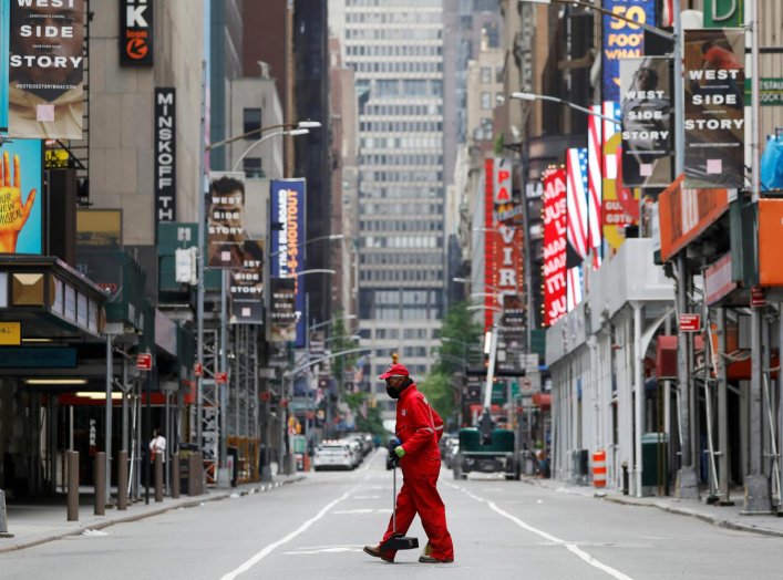 A street cleaner walks through the closed Broadway theatre district near Times Square following the outbreak of the coronavirus disease (COVID-19) in Manhattan, New York City, U.S., May 24, 2020. REUTERS/Andrew Kelly