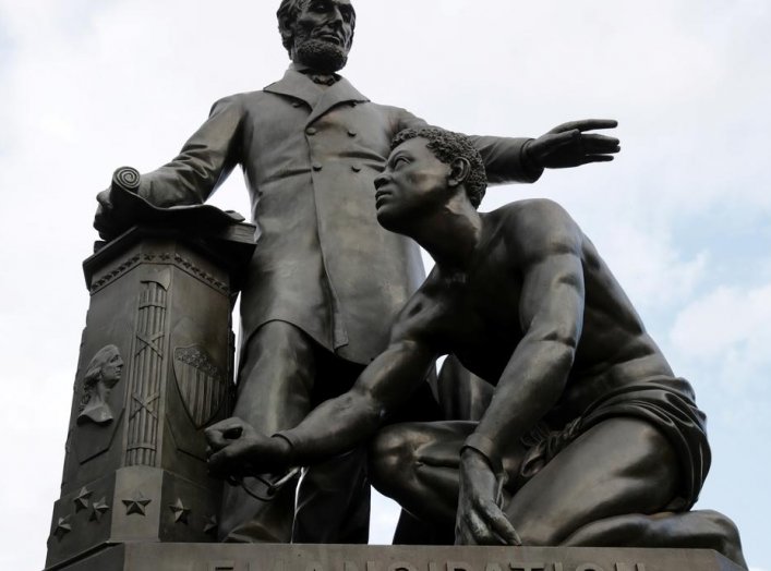 The Emancipation Memorial, depicting former U.S. President Abraham Lincoln standing over a freed slave, is pictured in Lincoln Park in Washington, U.S. June 19, 2020. REUTERS/Jonathan Ernst