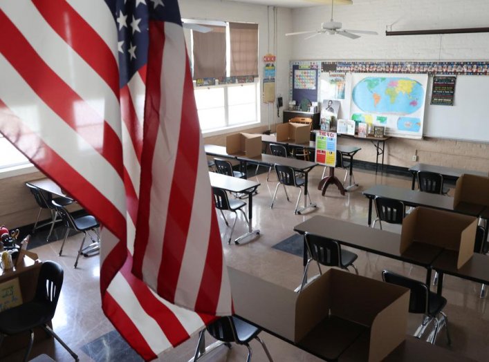 Social distancing dividers for students are seen in a classroom at St. Benedict School, amid the outbreak of the coronavirus disease (COVID-19), in Montebello, near Los Angeles, California, U.S., July 14, 2020. REUTERS/Lucy Nicholson