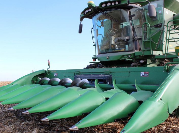 A farmer's corn harvesting combine is seen during the corn harvest as farmers struggle with the effects of weather and ongoing tariffs resulting from the trade war between the United States and China that are effecting their agricultural business in Eldon