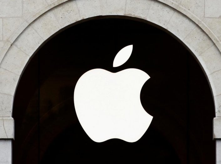 Apple logo is seen on the Apple store at The Marche Saint Germain in Paris, France July 15, 2020. REUTERS/Gonzalo Fuentes