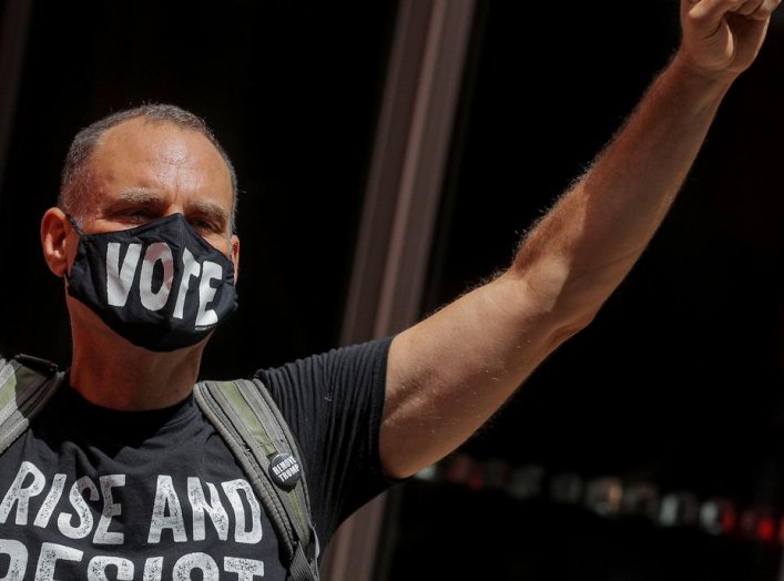 Protesters gather outside BlackRock's headquarters calling on presumptive 2020 Democratic presidential nominee Joe Biden to 'reject BlackRock executives as potential presidential appointees' in New York, U.S., August 11, 2020. REUTERS/Brendan McDermid