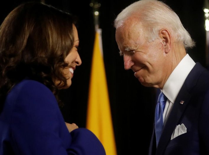 Democratic presidential candidate and former Vice President Joe Biden and vice presidential candidate Senator Kamala Harris are seen at the stage during a campaign event, their first joint appearance since Biden named Harris as his running mate, at Alexis