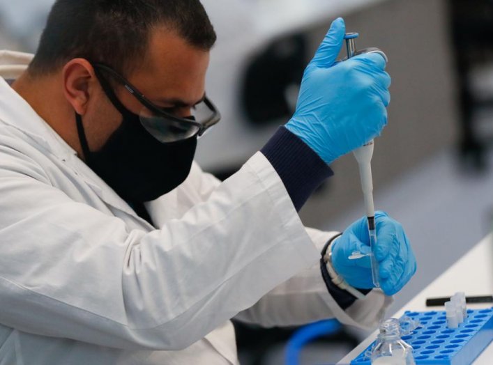 A laboratory technician of biotechnology company mAbxience is seen working, amid the outbreak of the coronavirus disease (COVID-19), in Buenos Aires, Argentina August 13, 2020. REUTERS/Agustin Marcarian