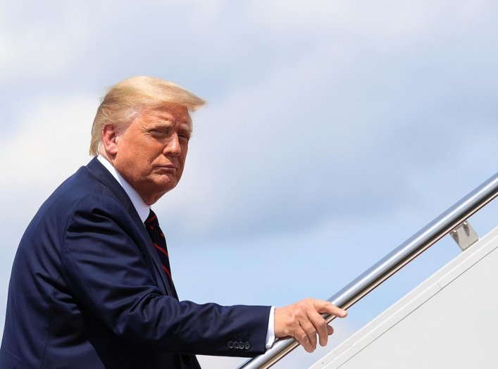U.S. President Donald Trump boards Air Force One as he departs on campaign travel to Old Forge, Pennsylvania at Joint Base Andrews, Maryland, U.S., August 20, 2020. REUTERS/Tom Brenner