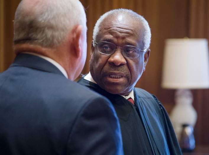 Sonny Perdue is sworn in as the 31st Secretary of Agriculture by U.S. Supreme Court Justice Clarence Thomas with his wife Mary and family April 25, 2017, at the Supreme Court in Washington, D.C.. Photo by Preston Keres