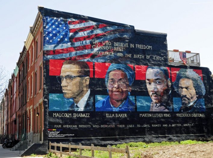 Mural on the wall of row houses in Philadelphia. The artist is Parris Stancell, sponsored by the Freedom School Mural Arts Program. 17 April 2009. Flickr/Tony Fischer. Creative Commons Attribution 2.0 Generic (CC BY 2.0)