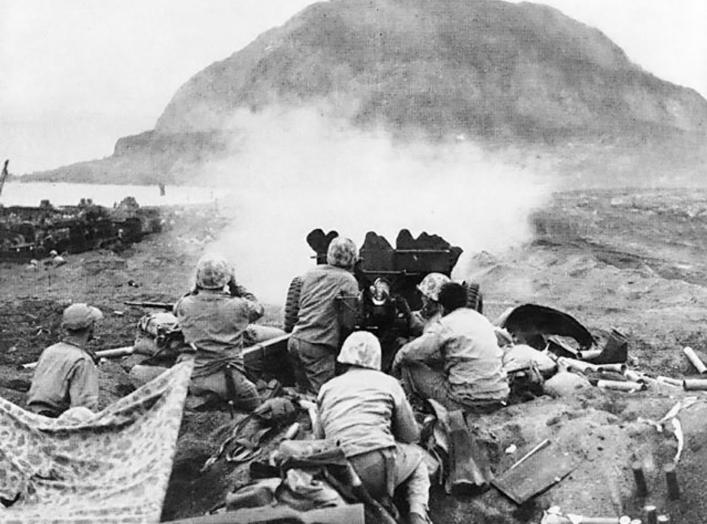 https://en.wikipedia.org/wiki/Battle_of_Iwo_Jima#/media/File:37mm_Gun_fires_against_cave_positions_at_Iwo_Jima.jpg