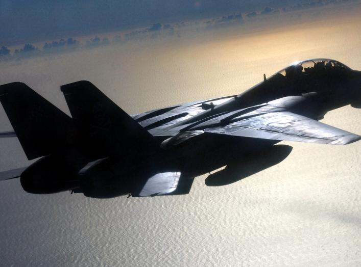 An air-to-air overhead view of a Fighter Squadron 1 (VF-1) F-14A Tomcat aircraft. 