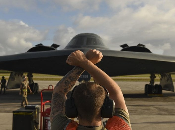 U.S. Air Force maintainers assigned to the 393rd Expeditionary Bomb Squadron, deployed from Whiteman Air Force Base, Missouri, secure a B-2 Spirit Stealth Bomber after a flight at Naval Support Facility Diego Garcia, to support a Bomber Task Force mission
