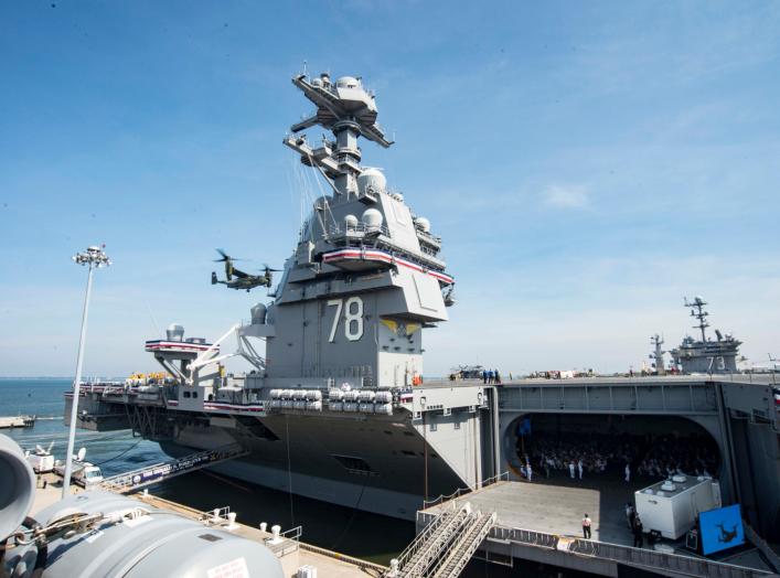 MV-22 Ospreys assigned to the U.S. Presidential Helicopter Squadron land on the flight deck of the aircraft carrier USS Gerald R. Ford (CVN 78)during the ship's commissioning ceremony at Naval Station Norfolk, Va.