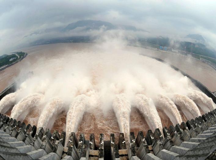 Water is discharged from the Three Gorges Dam to lower the level in its reservoir in Yichang, Hubei province July 20, 2010. Torrential rain that has lashed China for weeks has killed dozens more people in China's west and forced authorities to close shipp