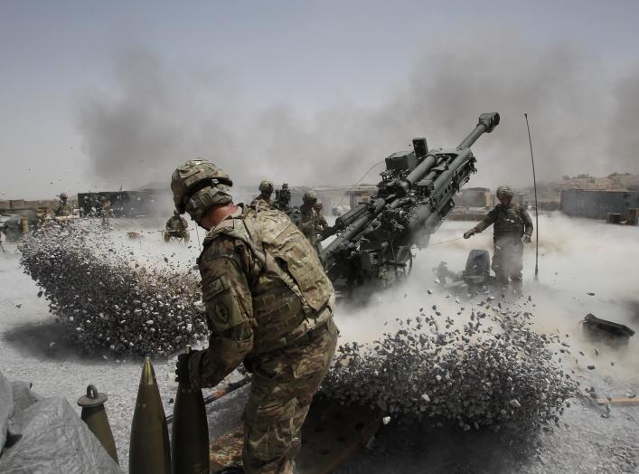 U.S. Army soldiers from the 2nd Platoon, B battery 2-8 field artillery, fire a howitzer artillery piece at Seprwan Ghar forward fire base in Panjwai district, Kandahar province southern Afghanistan, June 12, 2011. REUTERS/Baz Ratner 