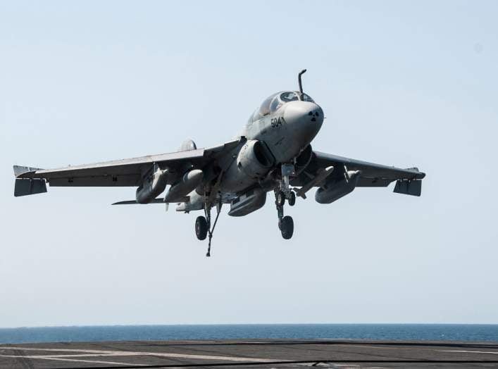 An EA-6B Prowler attached to the Garudas of Electronic Attack Squadron (VAQ) 134 lands aboard the aircraft carrier USS George H.W. Bush (CVN 77) after conducting strike missions against the Islamic State of Iraq and the Levant (ISIL)