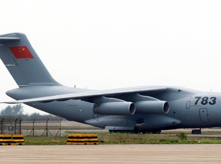 A Y-20 transport plane of People's Liberation Army Air Force is seen on the tarmac after its arrival for the upcoming China International Aviation & Aerospace Exhibition, in Zhuhai, Guangdong province, November 5, 2014. 